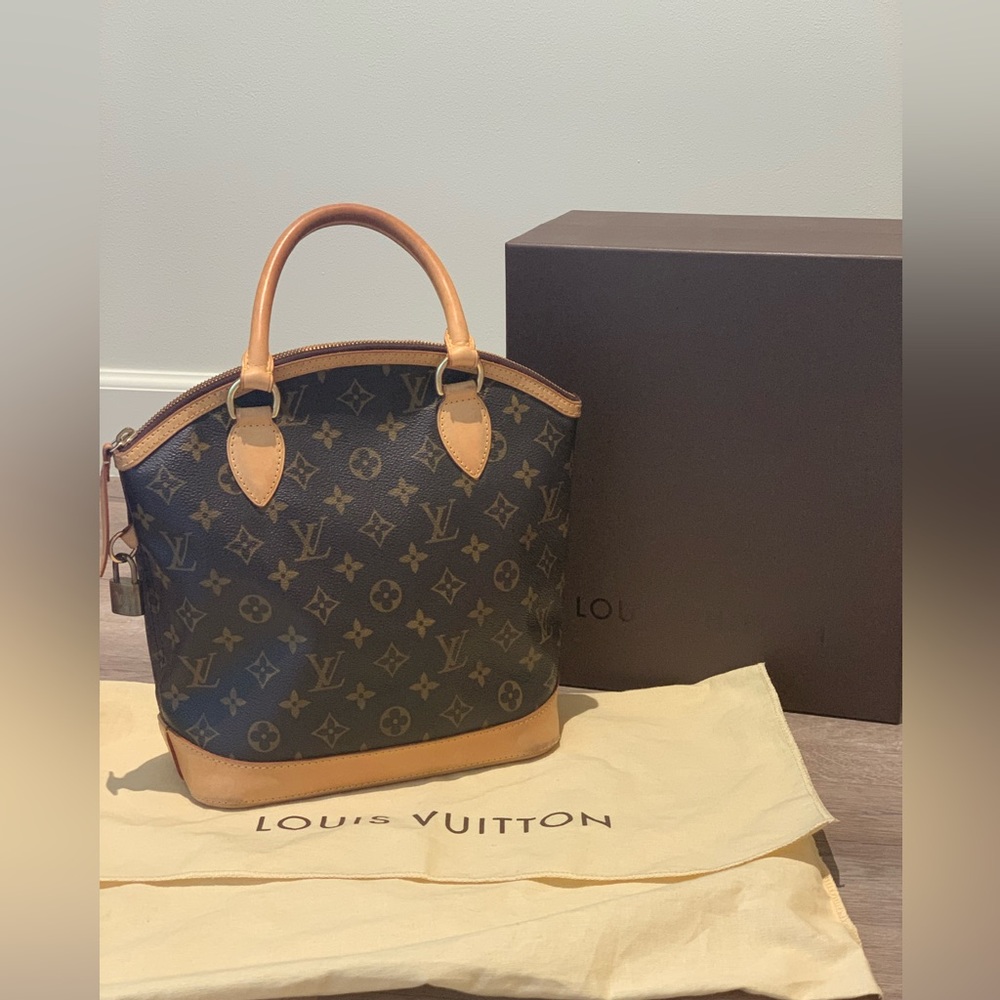 Authentic Louis Vuitton Monogram Lockit Vertical